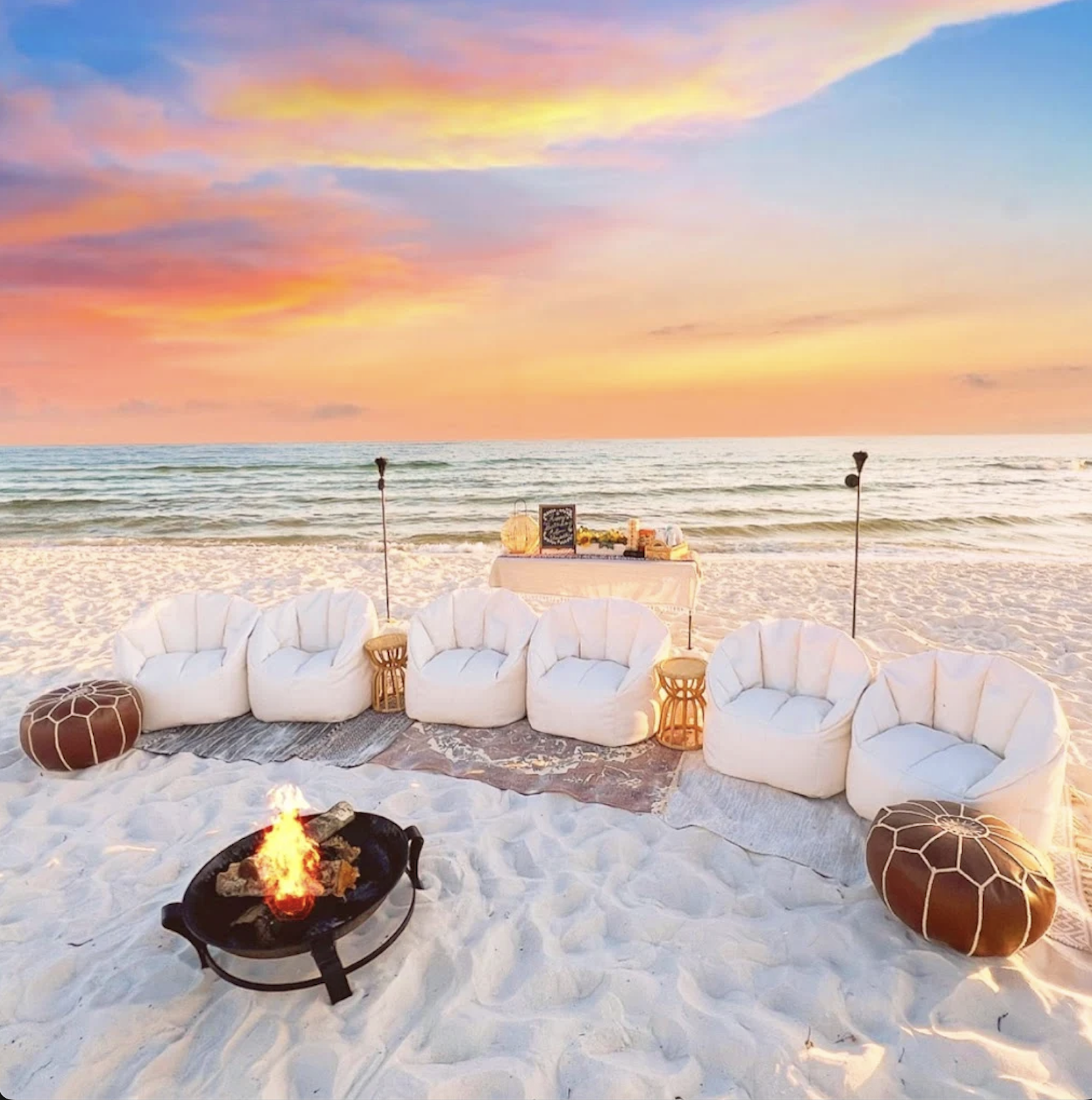 Beach Bonfire with 6 cushion bean bags, rugs, side tables, poofs, beach background and colorful sunset